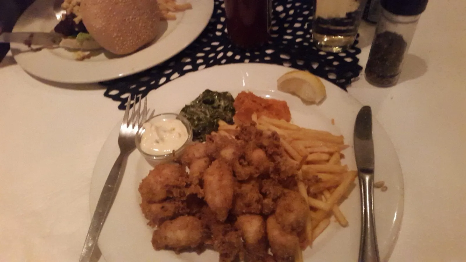 A plate of calamari and chips