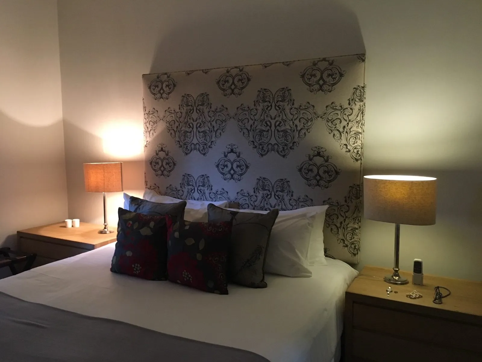 A bedroom in soft lamplight