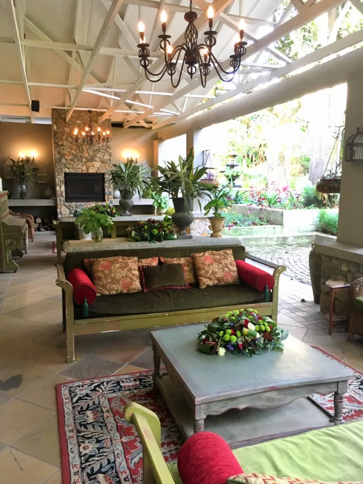 The lounge, deep sofas and patterned rugs