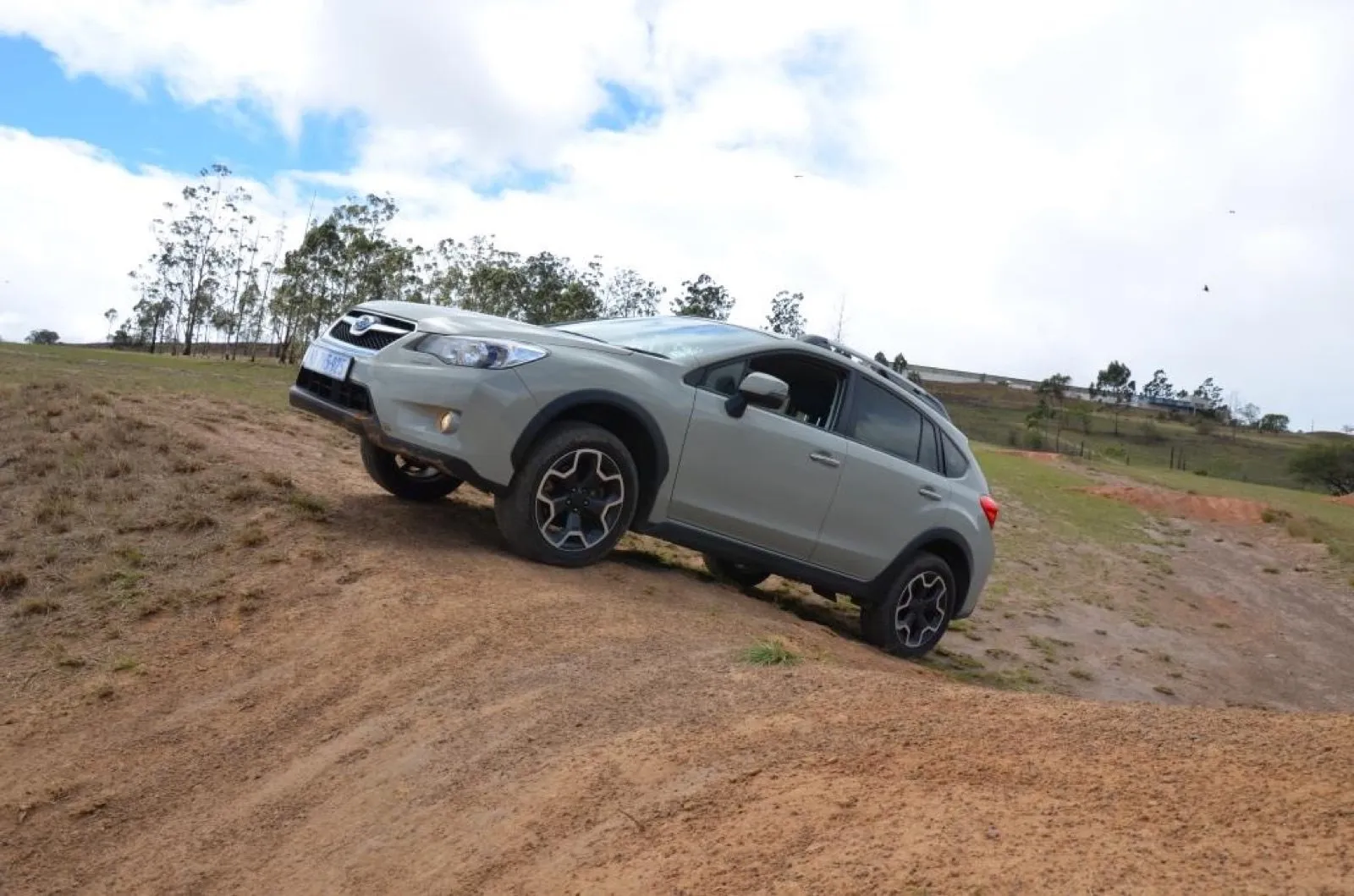A 4x4 working its way along the muddy track