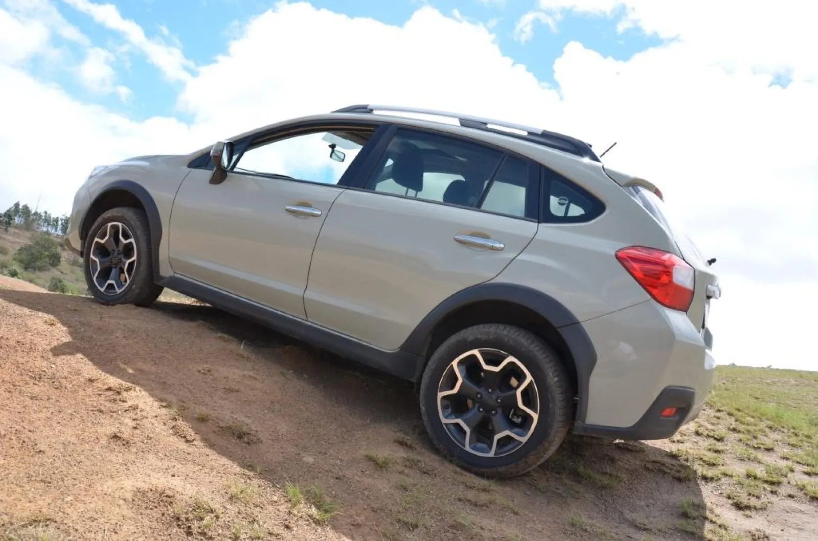 The vehicle at an angle on the trail