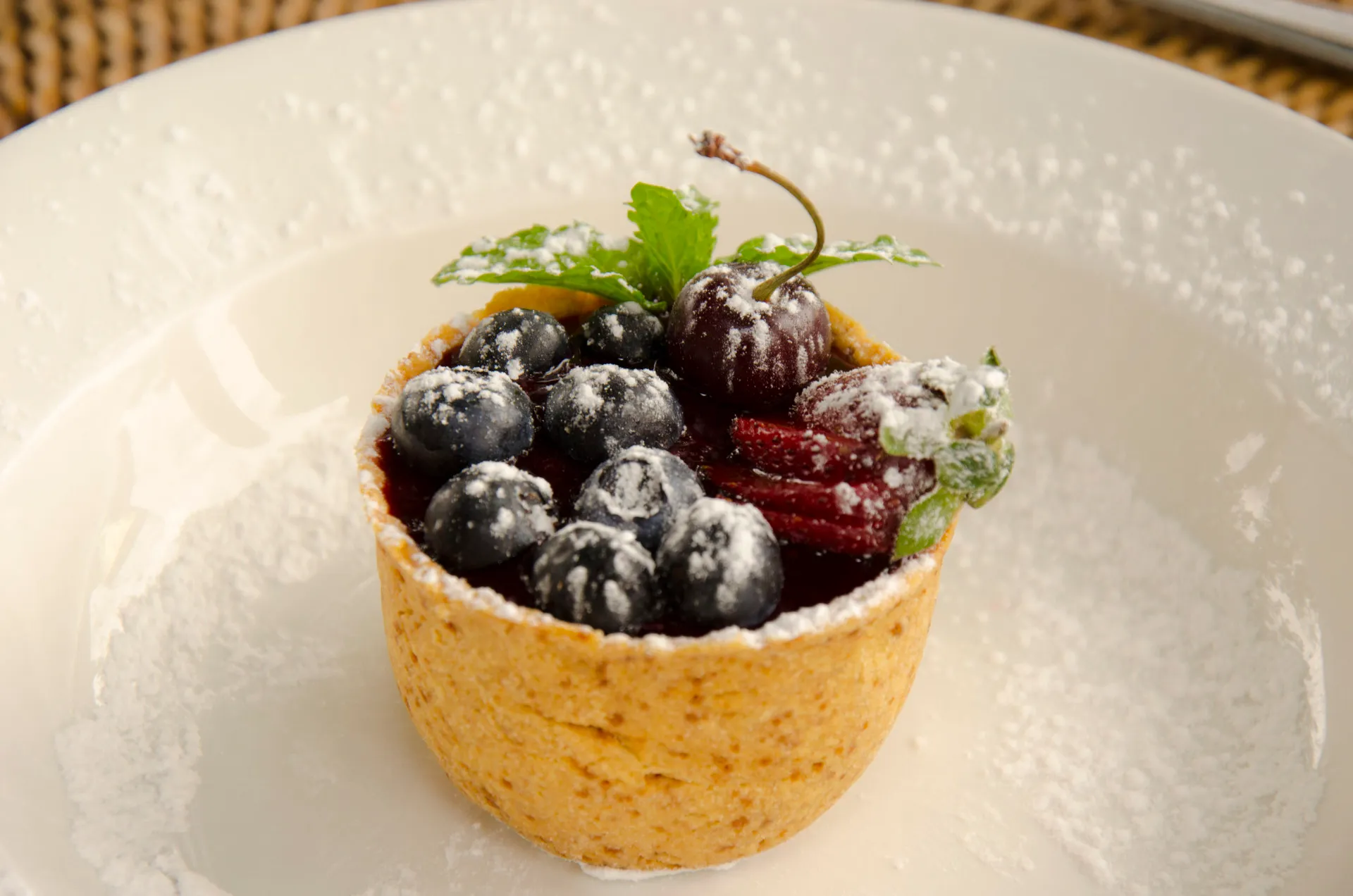 A berry tart served for dessert