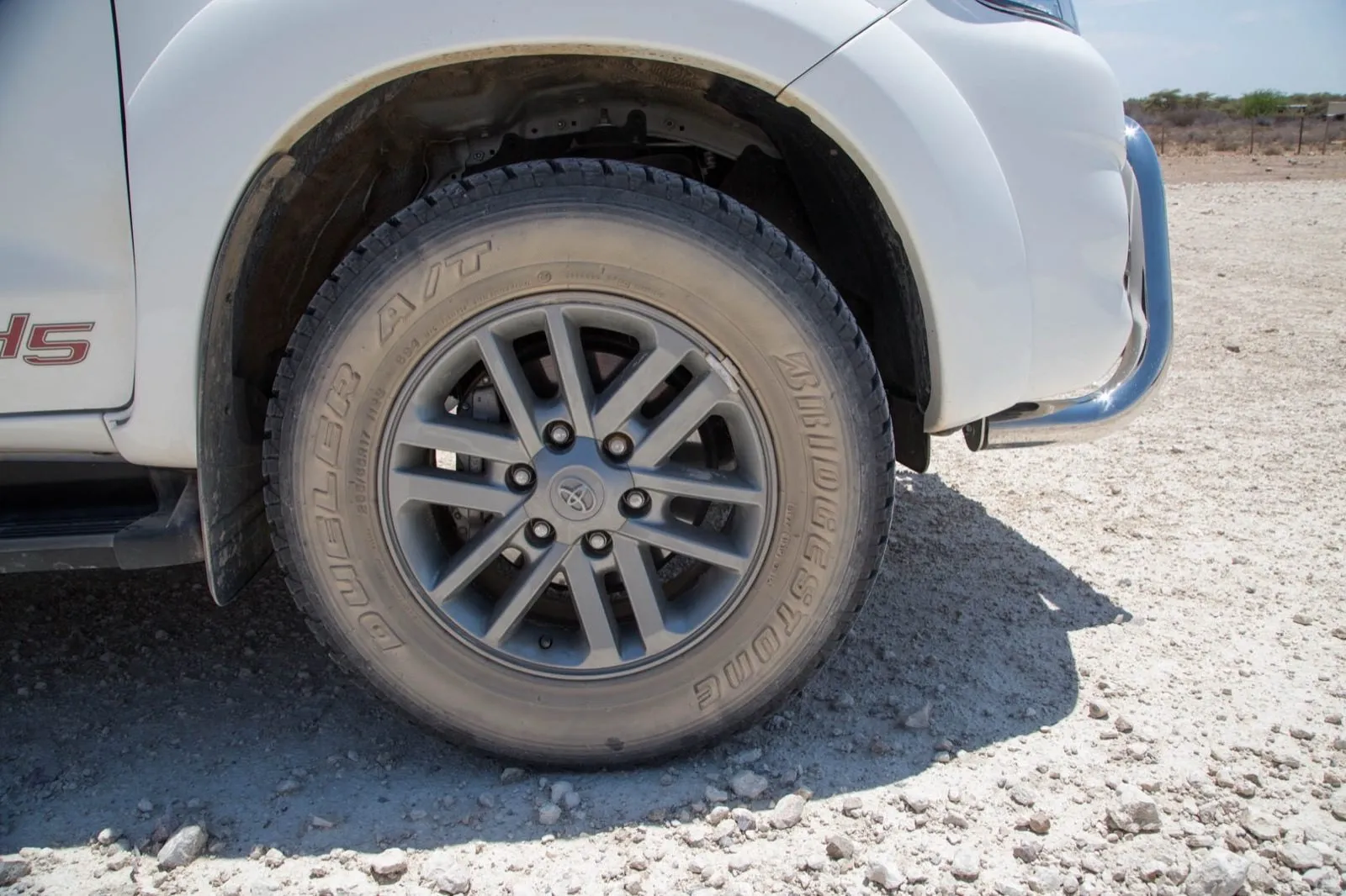 The bakkie's wheel on the gravel