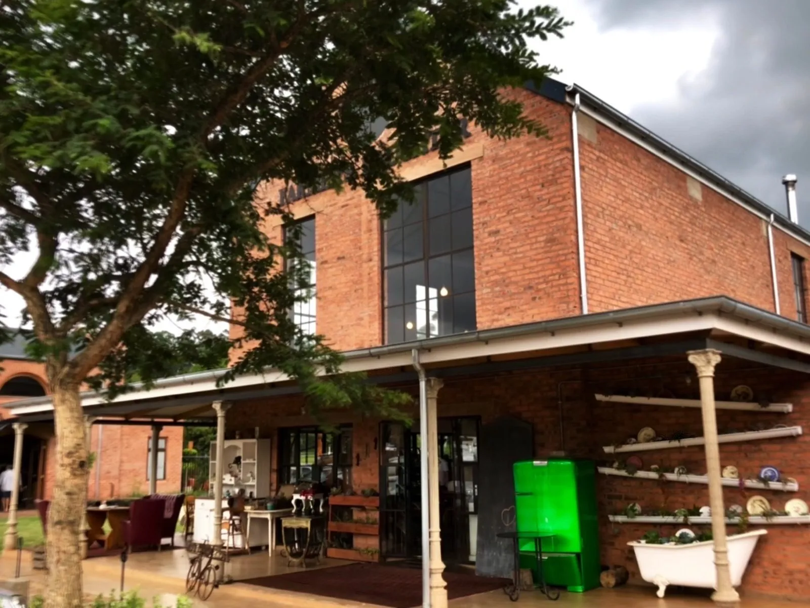 The red brick building and its verandah