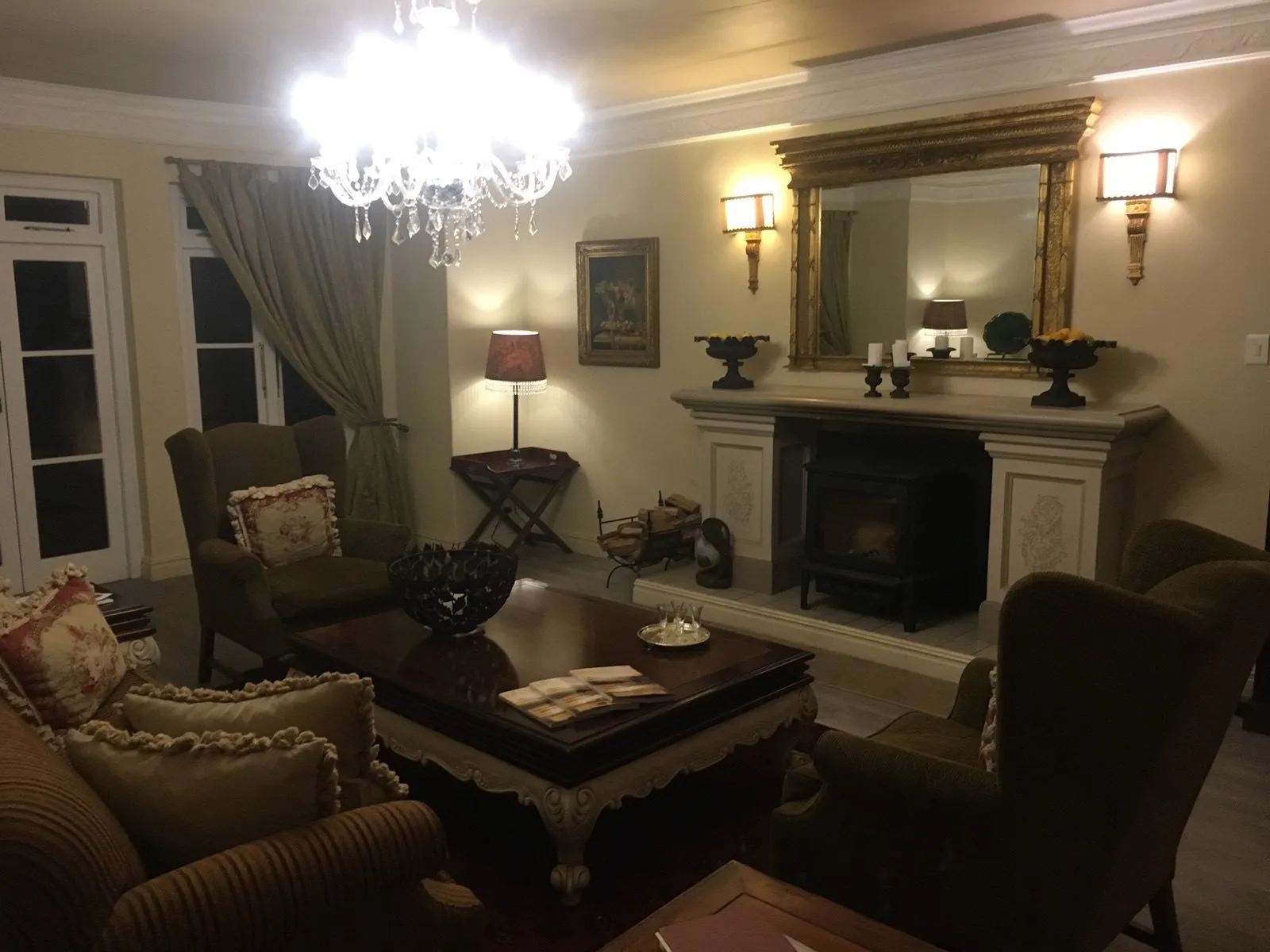 The lounge with a fire lit
