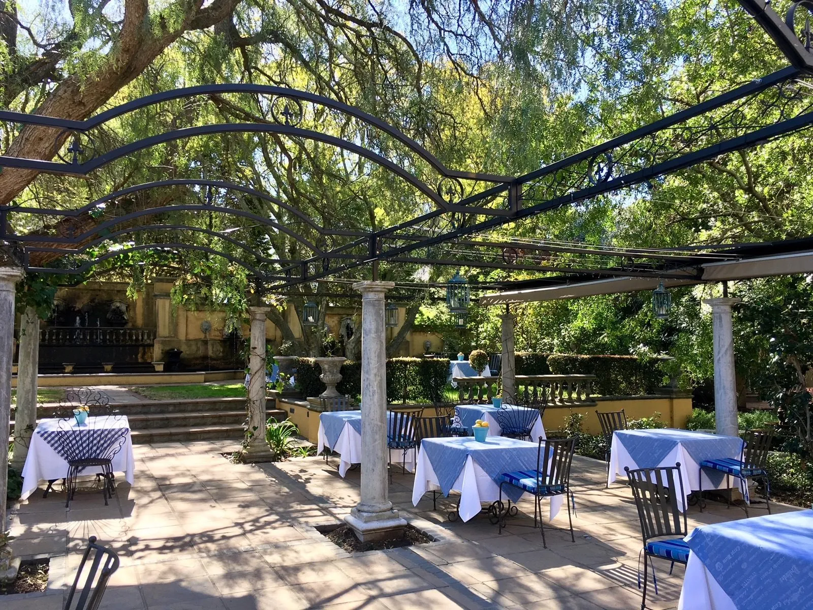 Tables set out under the vines