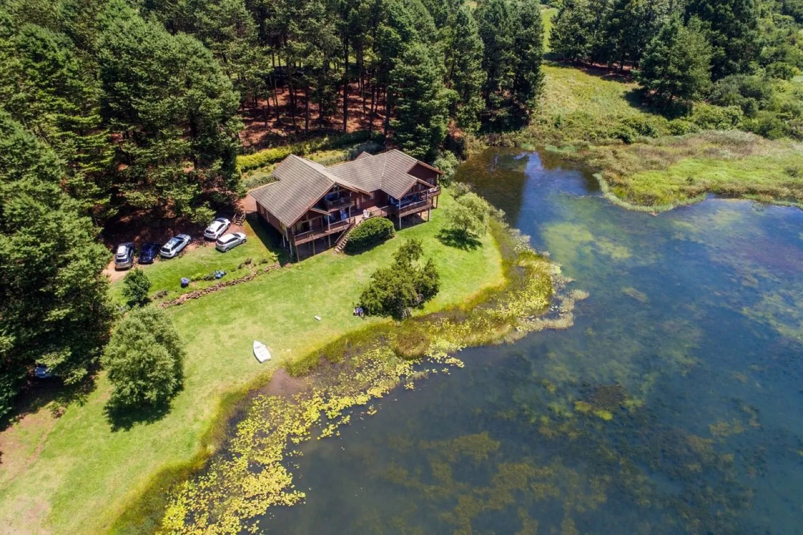 The lodges seen across the lake