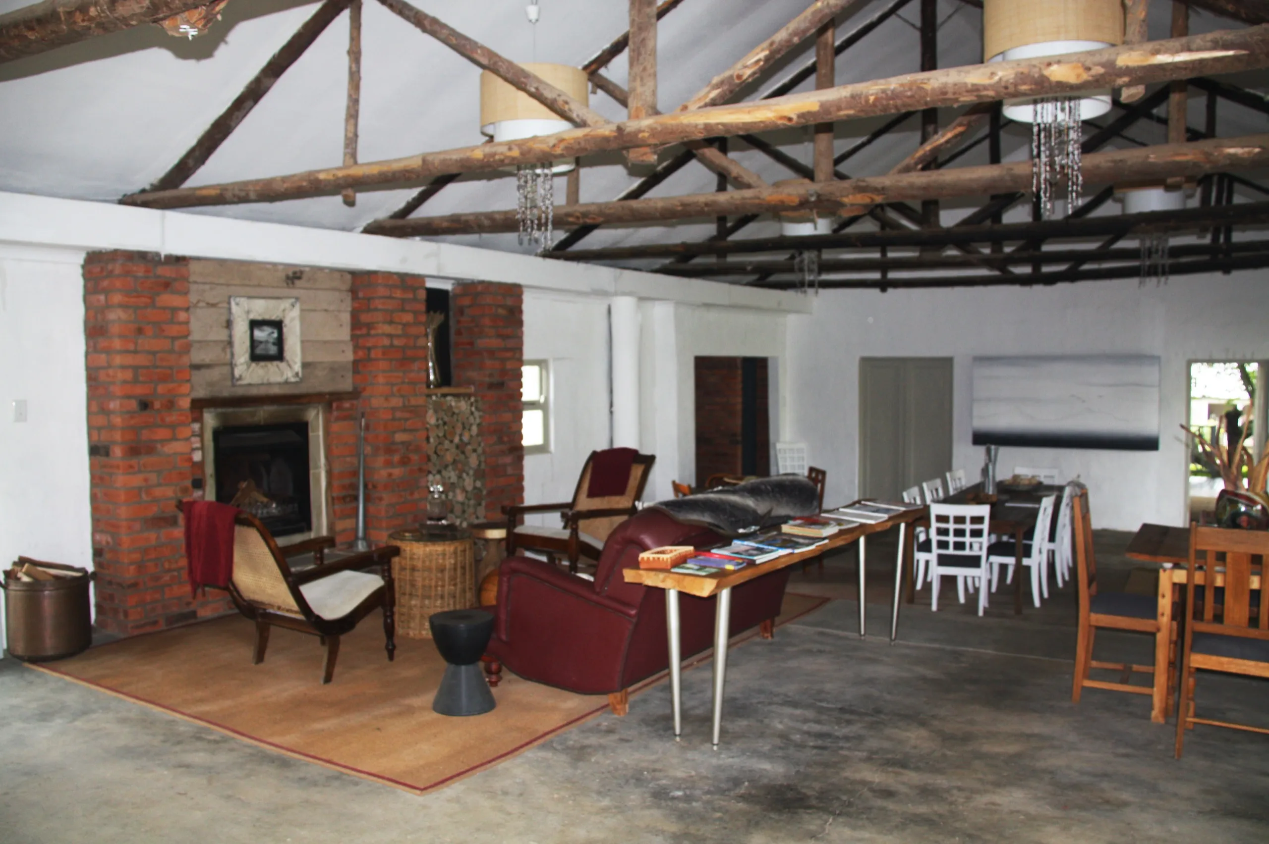 The dining and living area under a timber roof