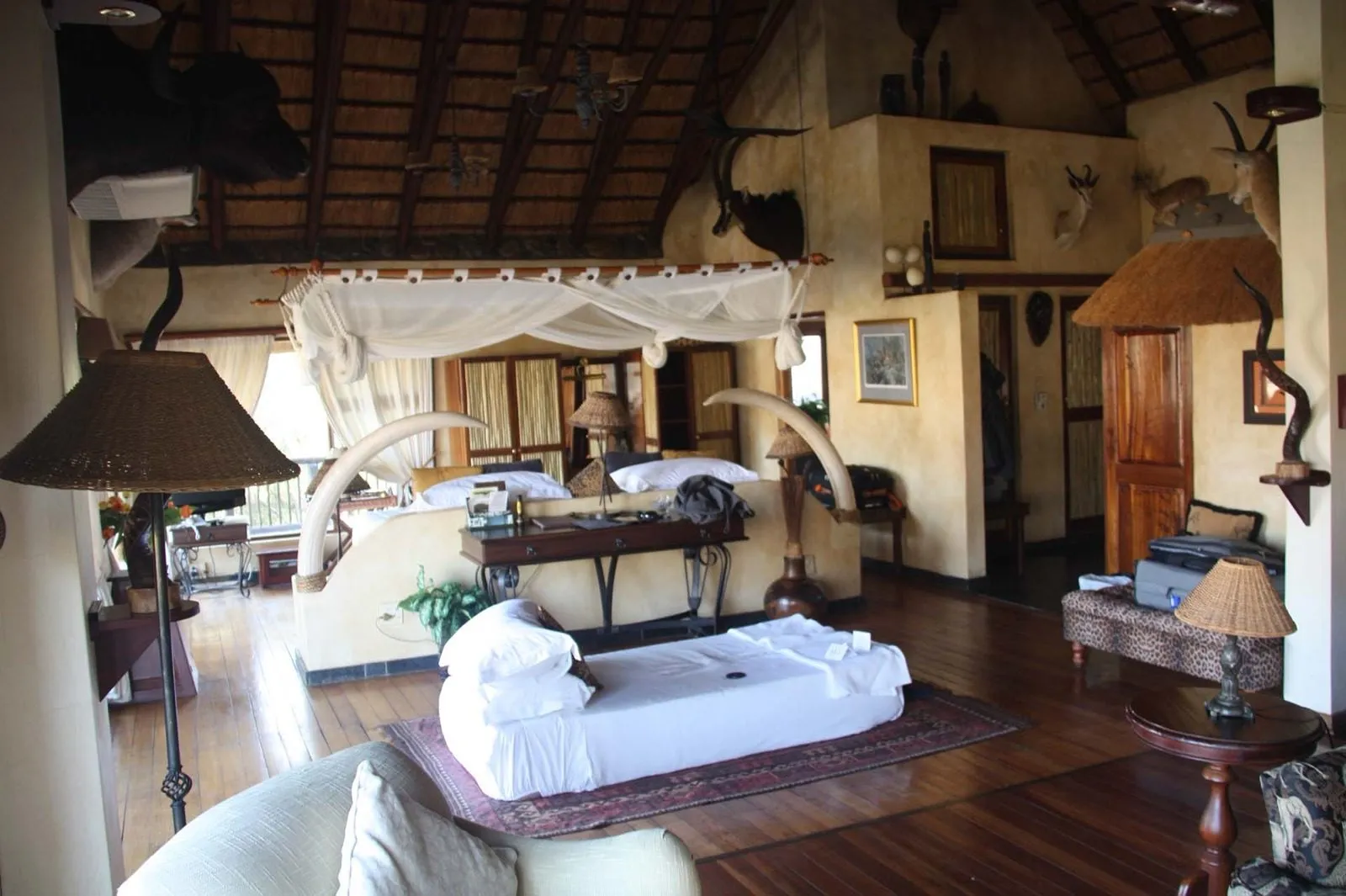 The lounge, deep chairs and timber