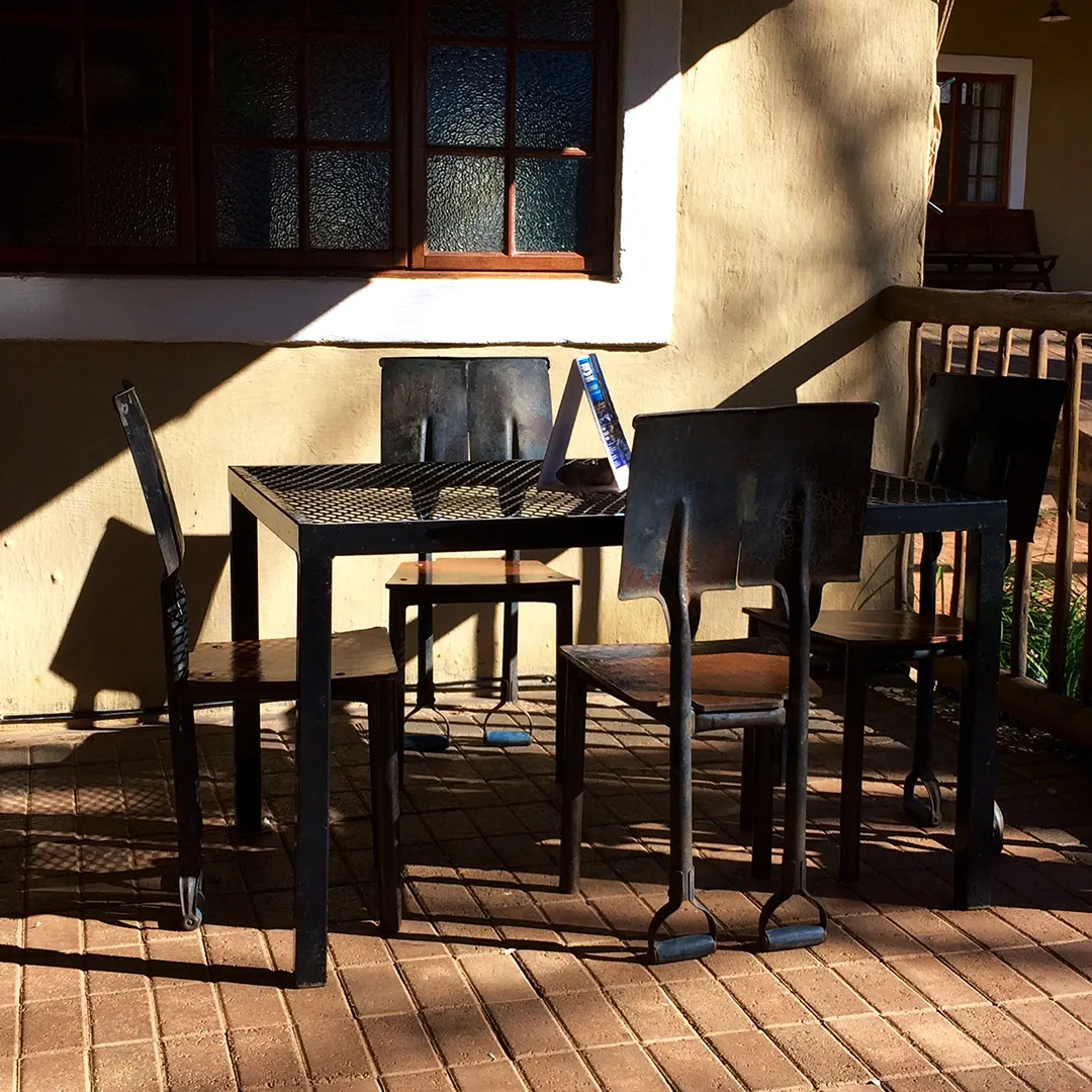 Tables set out on the deck at the lodge's pizza oven
