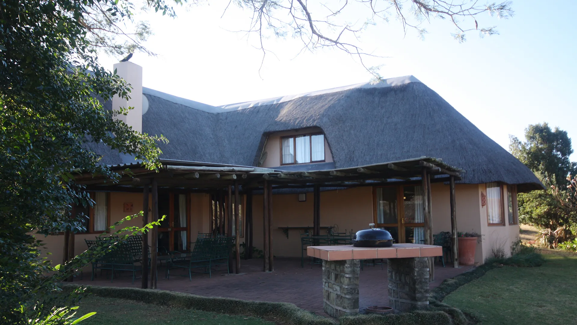 A thatched free-standing suite with its own terrace