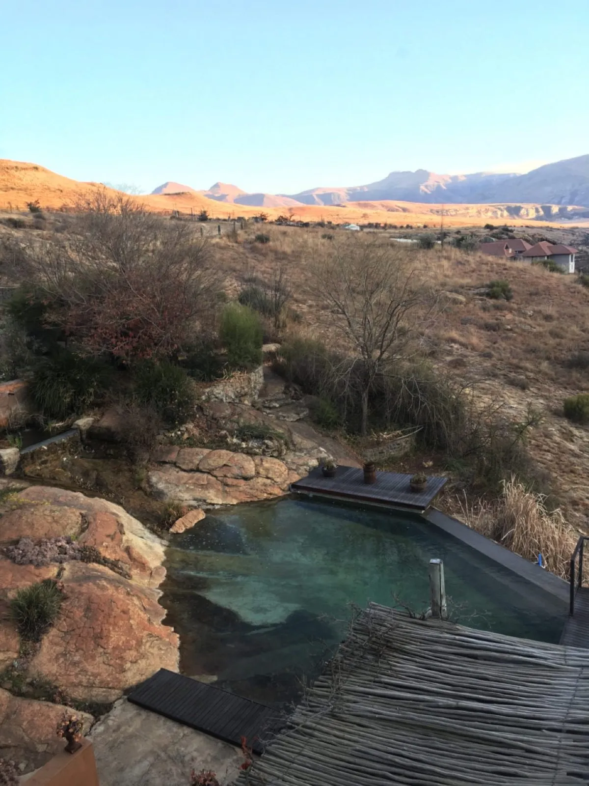 The stone house with the pool below